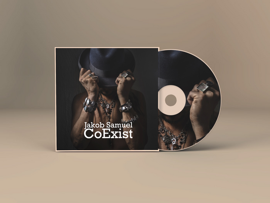CD cover and disc of 'CoExist' by Jakob Samuel on a beige background